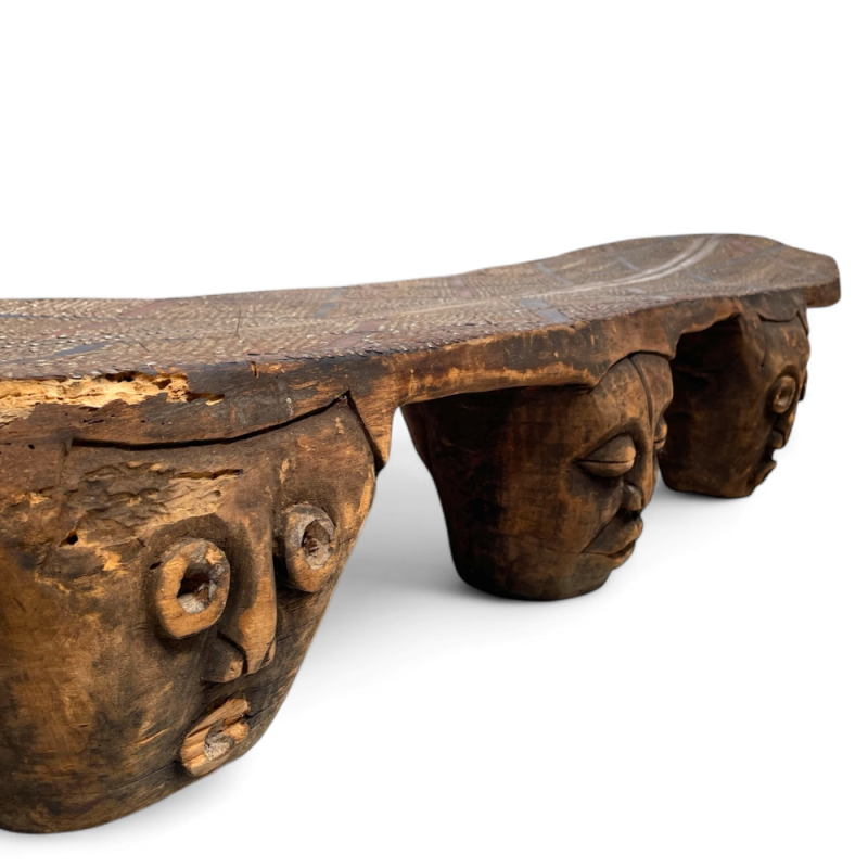 Hand-Carved Tribal Wooden Bench with Mask Motifs