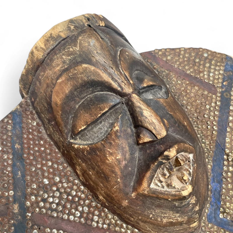 Hand-Carved Tribal Wooden Bench with Mask Motifs