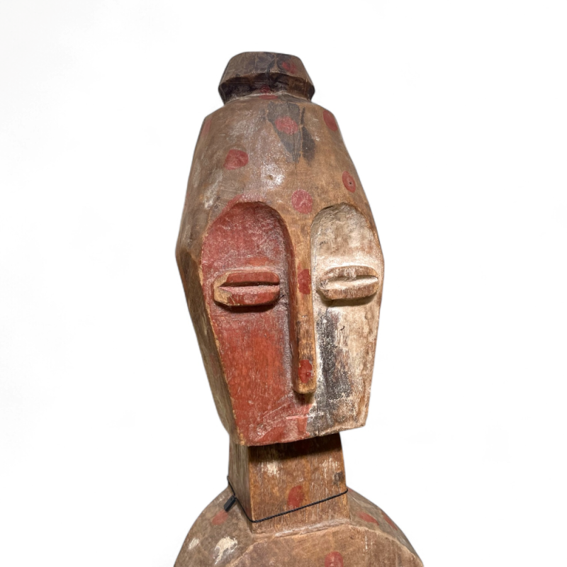 Geometric Tribal Figure with Painted Face