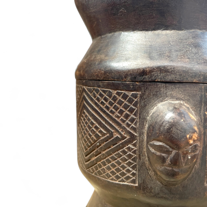 Carved African Lidded Container with Geometric and Facial Motifs